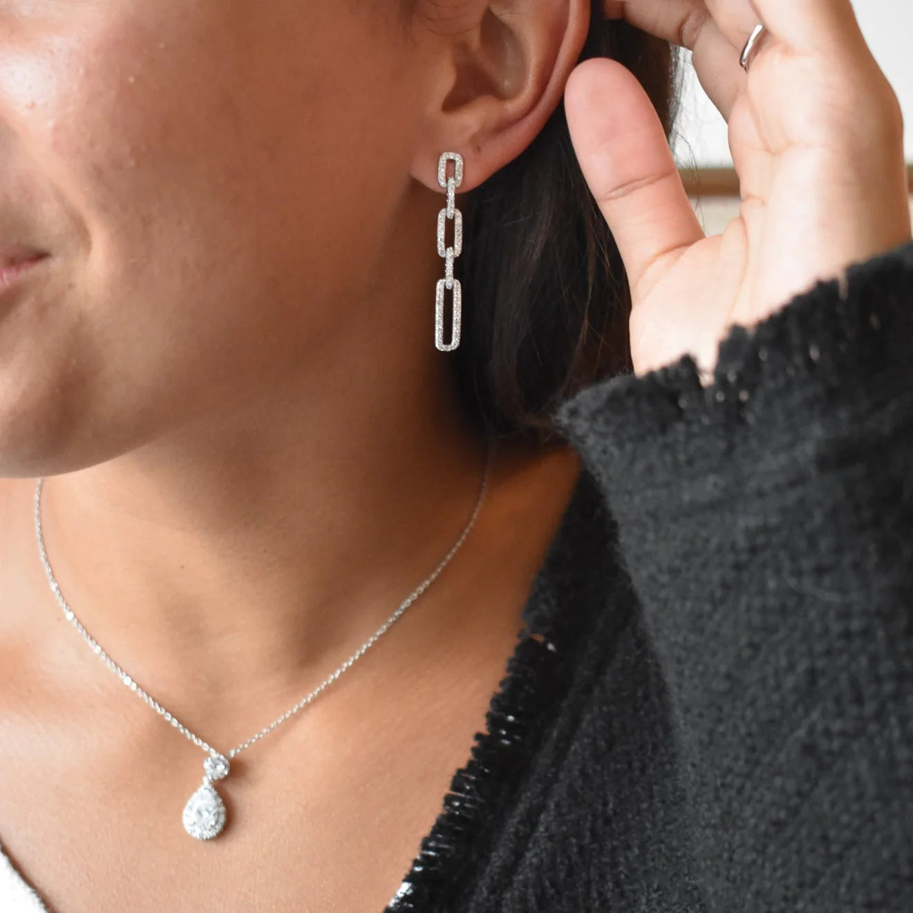 silver chain earring and necklace on a model, jewelry made by La Foi Jewelry