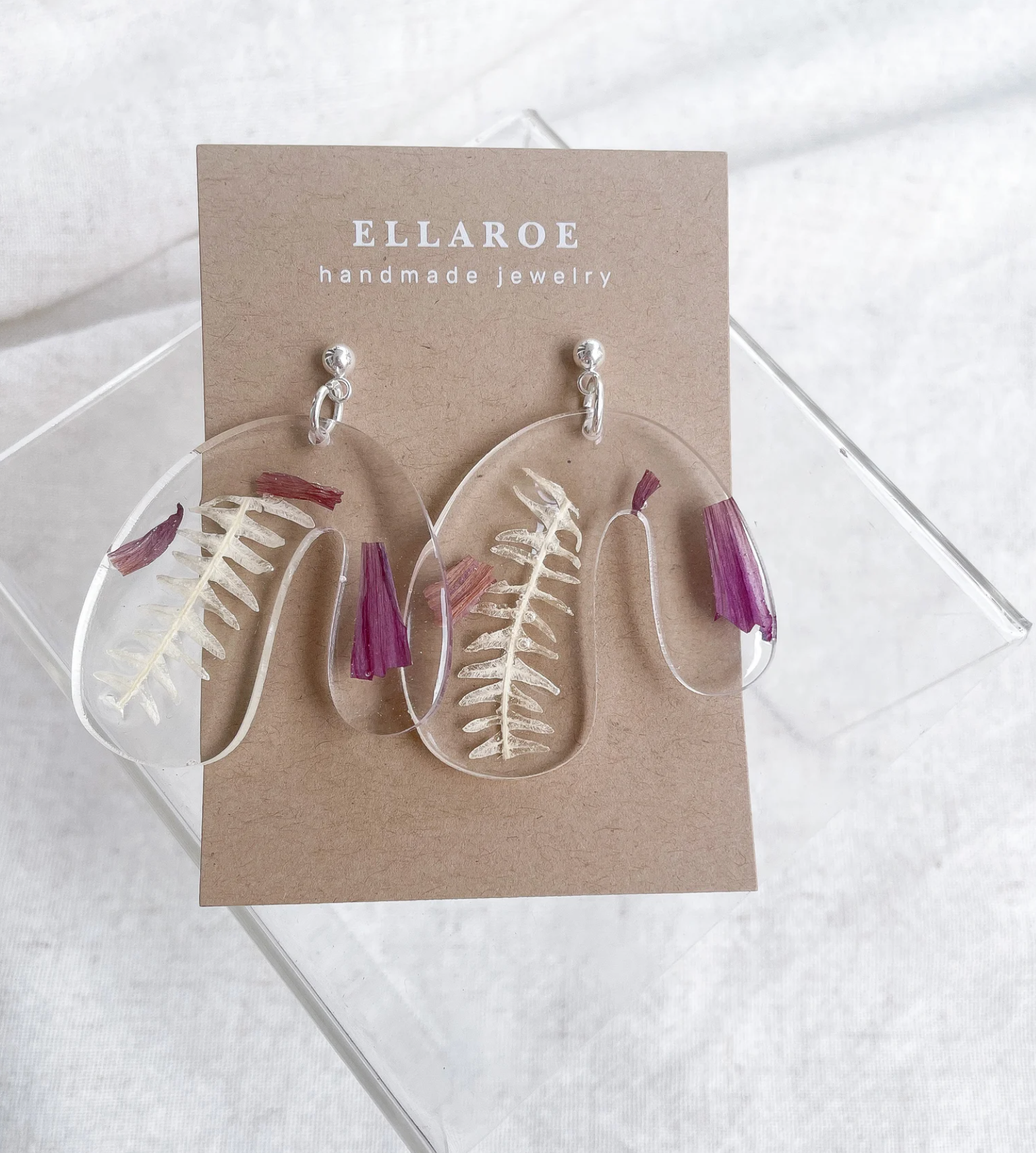 Resin dangly earrings made by Ellaroe