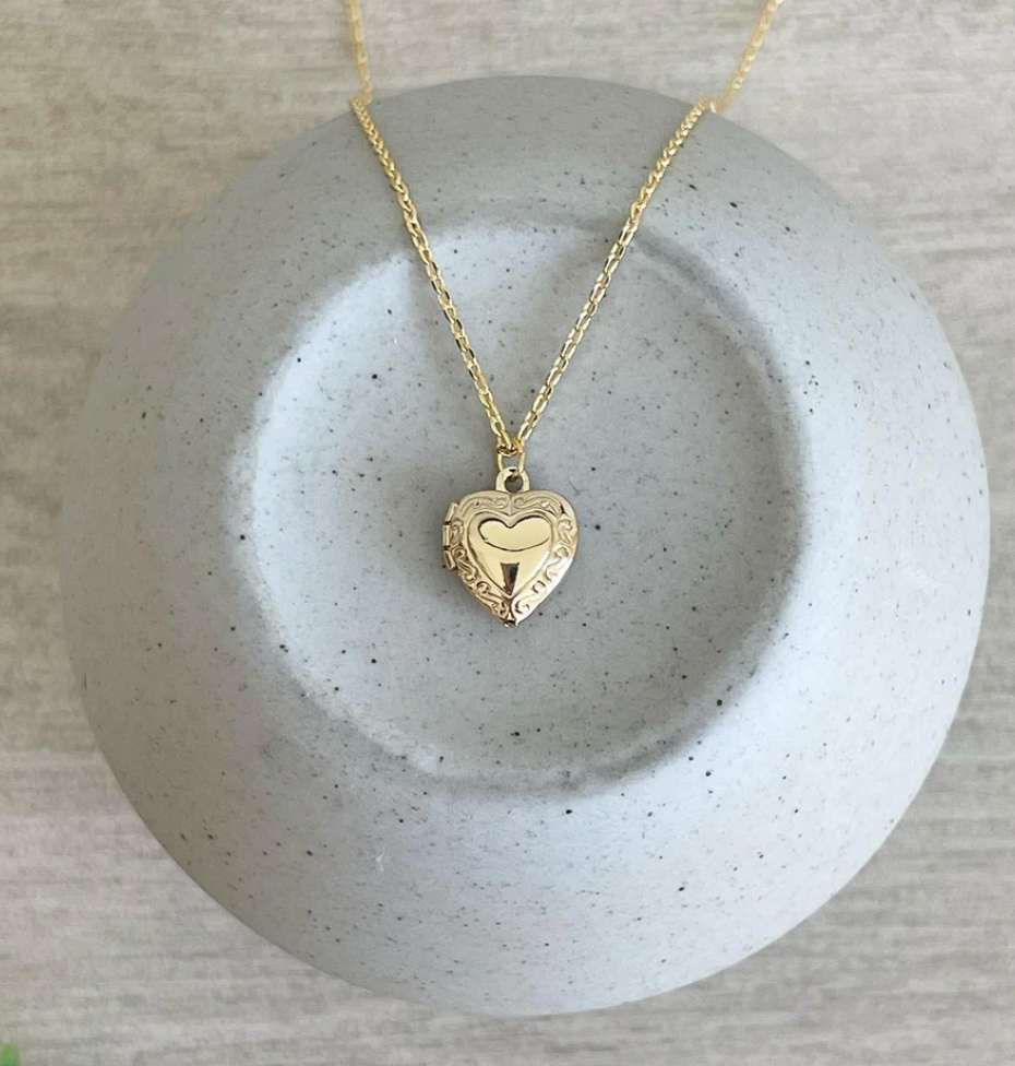 gold heart-shaped locket created by girls day out