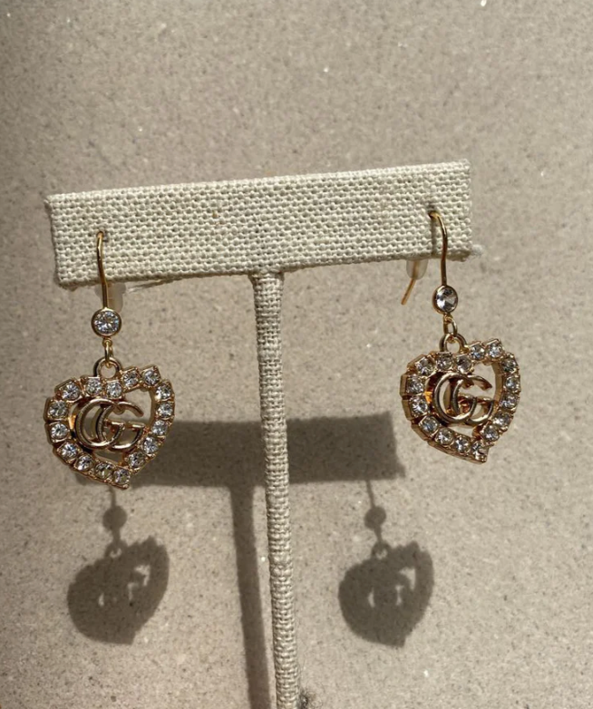 Gucci charm heart-shaped earrings made by Lottie and Lucy