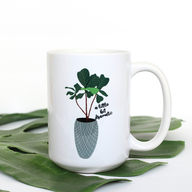 white mug featuring a fiddle leaf fig and the script "a little bit dramatic" - sold at Darling x Dashing in downtown Cville